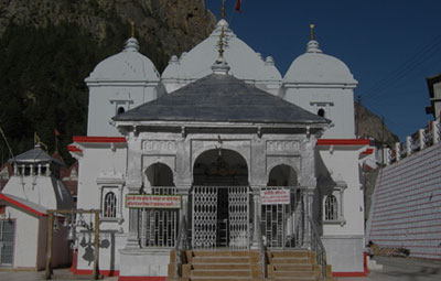 Gangotri Dham, located at the height of 3,100 meters (approx.) on the Himalayan range in Uttarkashi district of Uttarakhand, holds a very special place in the hearts of Hindus. It is one of the four sacred and important pilgrimage sites of Chota Char Dham Yatra in Uttarakhand. Amid all the natural beauty and grace which the mountains and altitude of the place affords, what makes Gangotri one of the holiest places is its intimate connection with River Ganga (the Ganges).<BR>Ganga Maa (mother), the much revered deity of Hindus, originates from the Gangotri glacier at Gaumukh which is some 18 km from the Gangotri town. It is said that Goddess Ganga came to earth in order to wash away the sins of King Bhagirathi's ancestors. From the folds of mythology till the present time, Ganga River has always been a sacred source of purity for the mankind. Coming to Gangotri for a religious tour is not only a religious duty but a spiritual calling too.